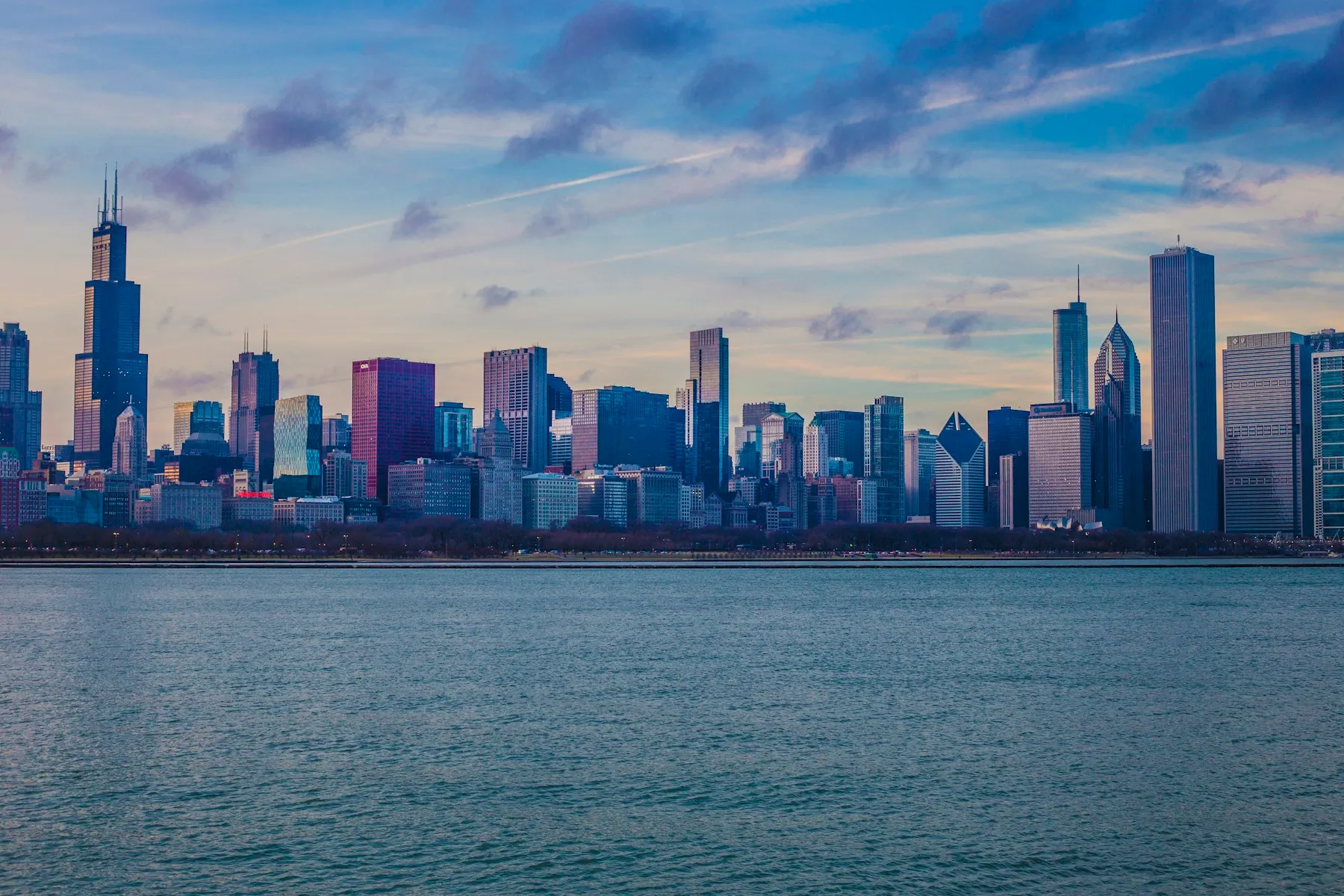 Chicago’s skyline across Lake Michigan in the evening.